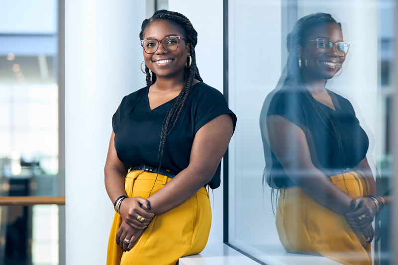 a person leaning against a window