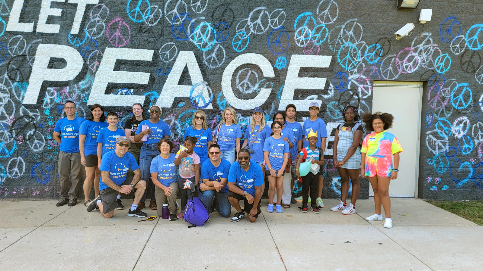 a group of people posing for a photo