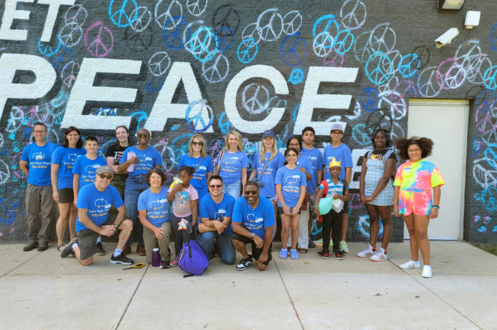 a group of people posing for a photo