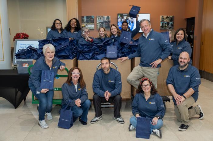 a group of people posing for a photo