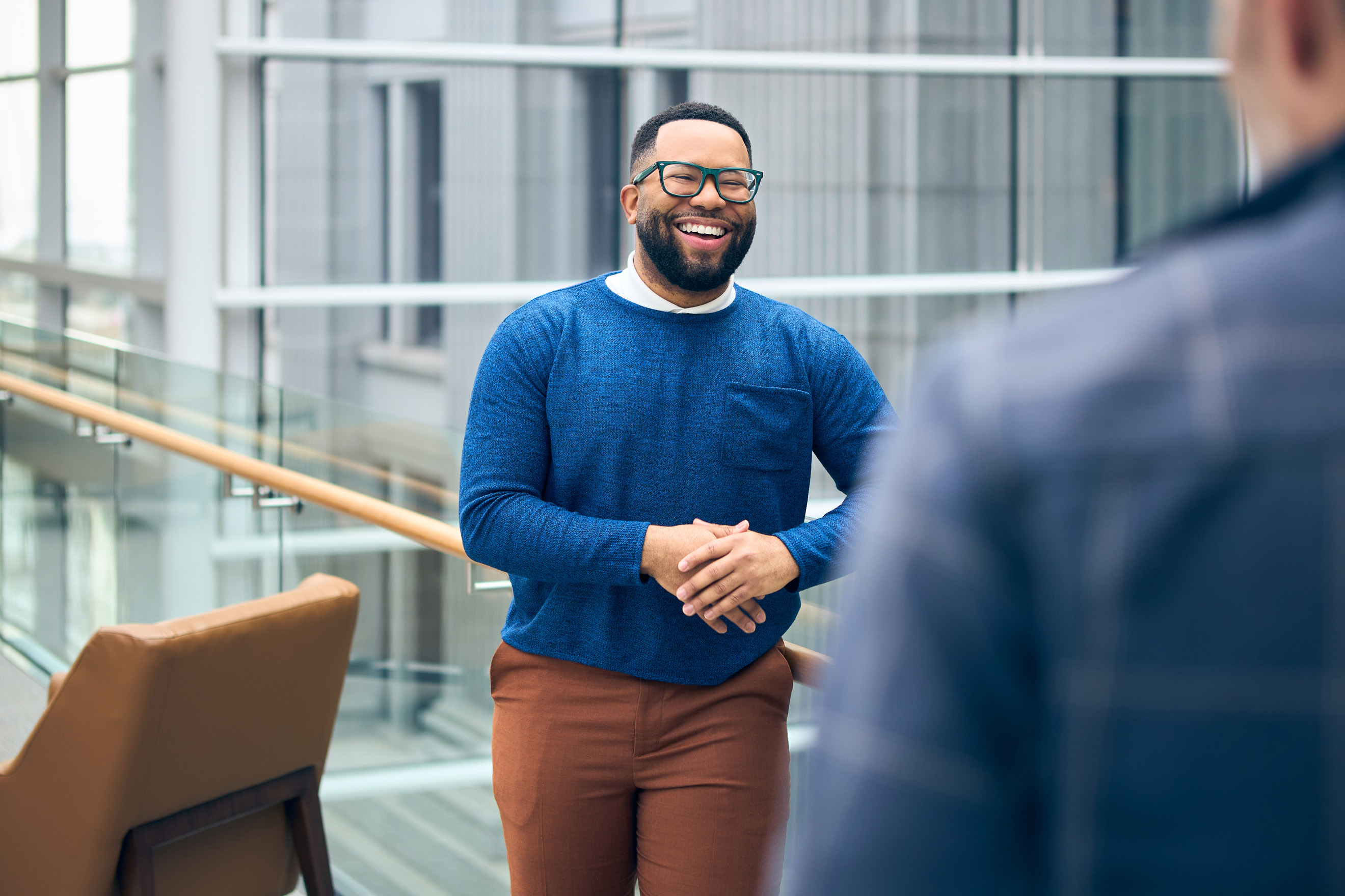 a person in a blue sweater