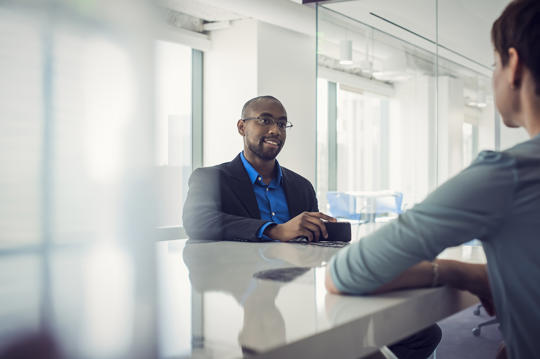 a person sitting at a counter