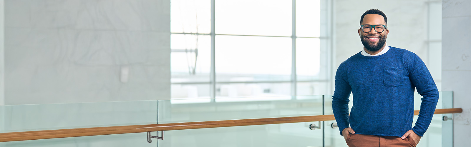 a glass railing in a room