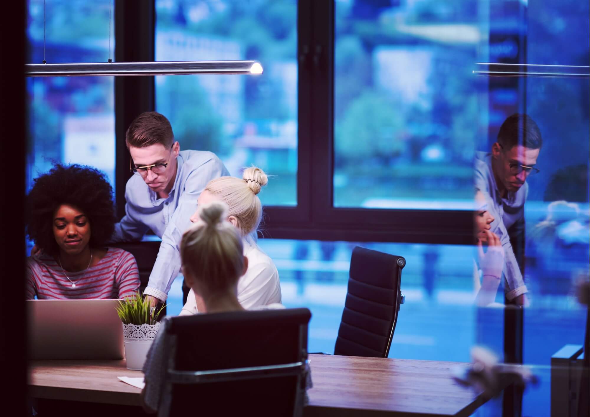 a group of people in an office