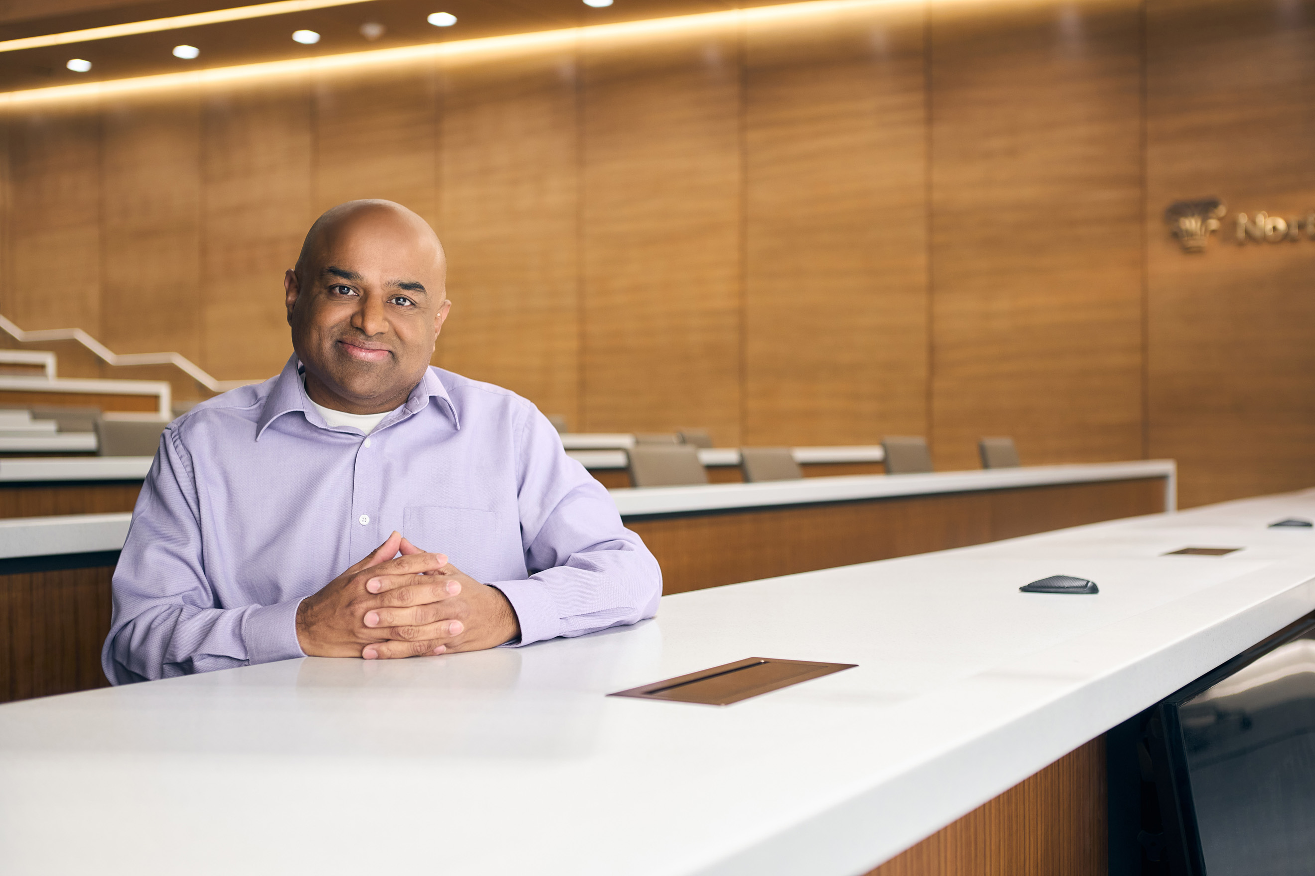 a person sitting at a white table